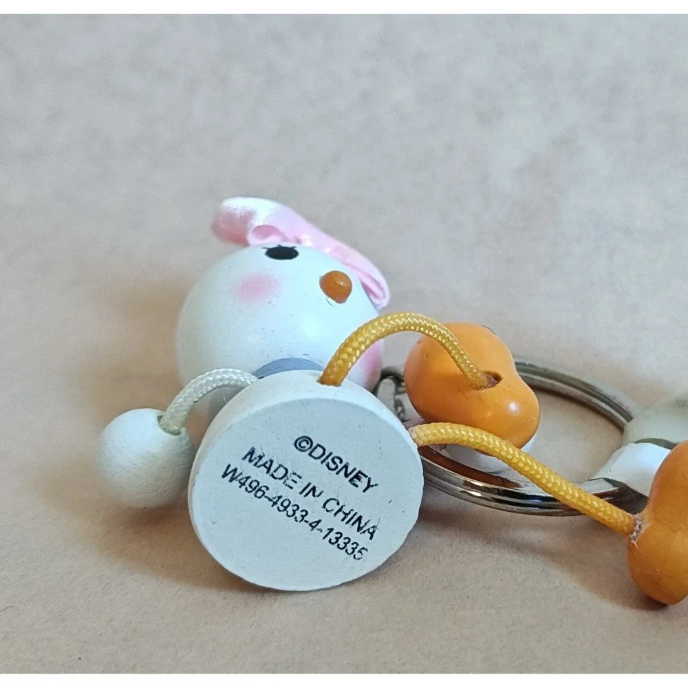 Disney Daisy Duck Keychain White Pink Wooden Figural Dangling Legs